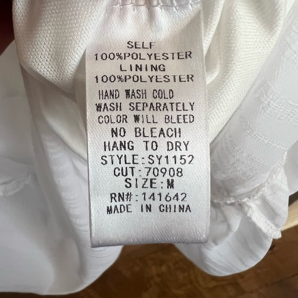 NWT Beautiful strapless white dress with open sides. Size medium. - Picture 7 of 7